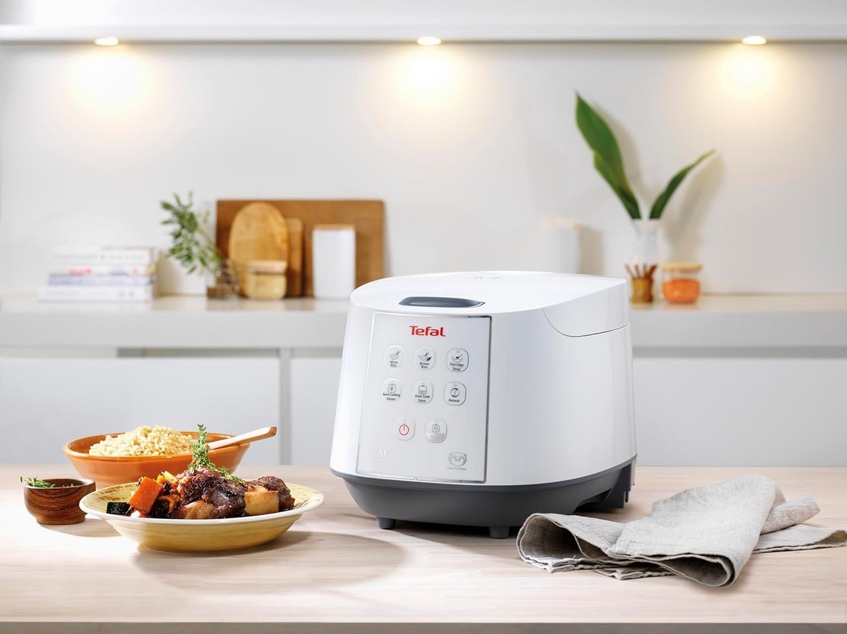 Read more about the article รีวิวเจาะลึก Tefal Easy Rice Compact RK732168 หม้อหุงข้าวดิจิทัลเทคโนโลยีหม้อทรงกลมเพื่อข้าวนุ่มฟูระดับพรีเมียม (สรุปข้อมูลอัปเดตล่าสุด)